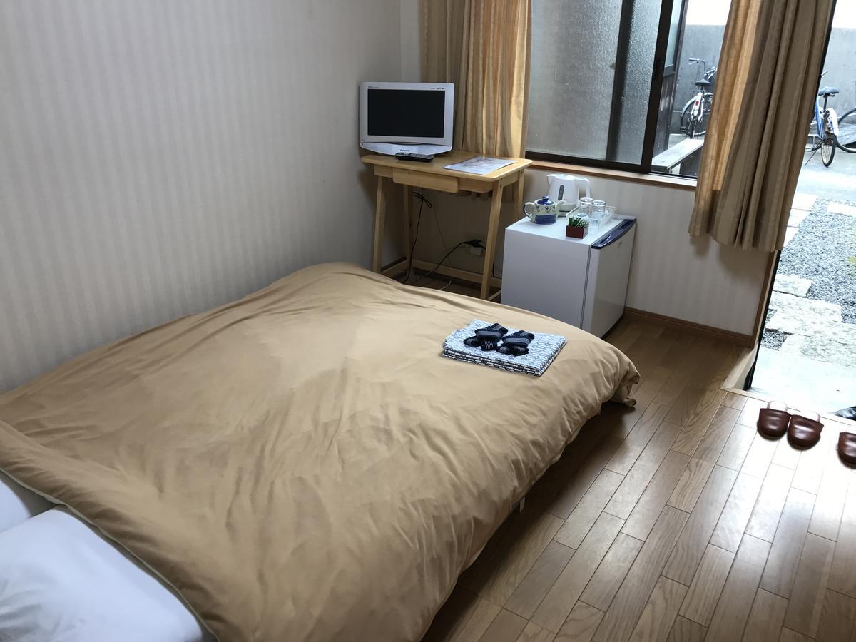 Minshuku Takenoya Hotel Naoshima Bagian luar foto